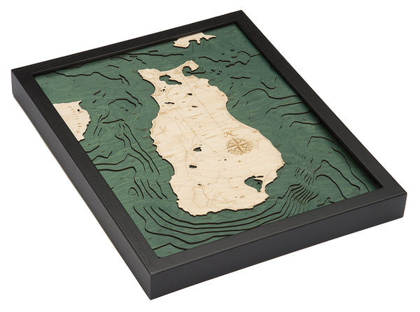 Beaver Island, Michigan wood chart using green and natural colored wood on white background with black frame laying flat