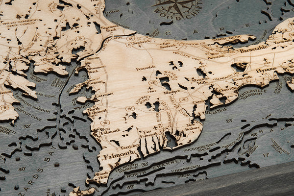 Cape Cod, Massachusetts wood chart map made using dark green and natural wood up close