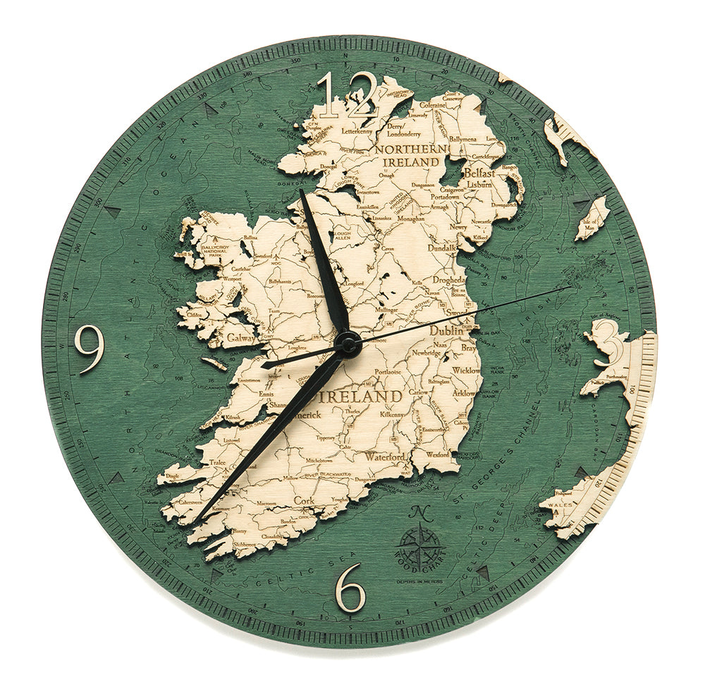 Ireland wood clock made using green and natural colored wood on white background
