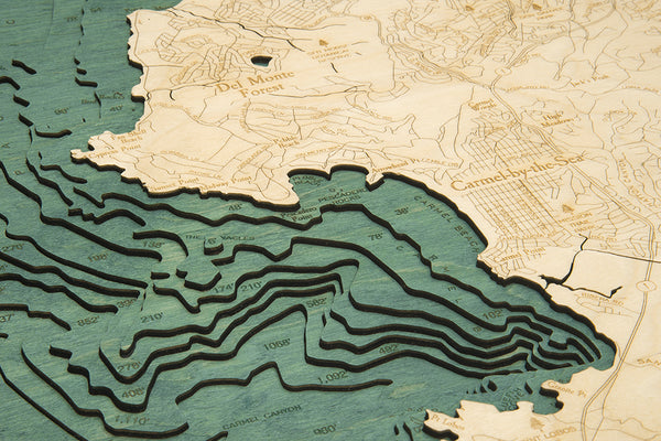 Carmel/Monterey, California wood chart map made using green and natural wood up close