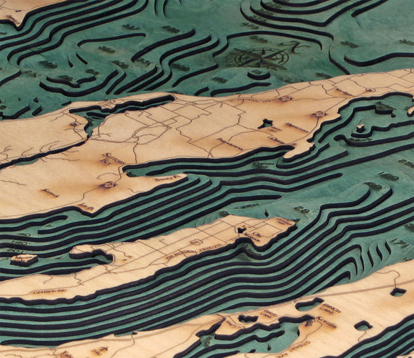 Grand Traverse Bay wood chart map made using green and natural colored wood up close