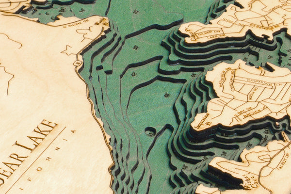 Big Bear Lake, California wood chart using green and natural colored wood up close