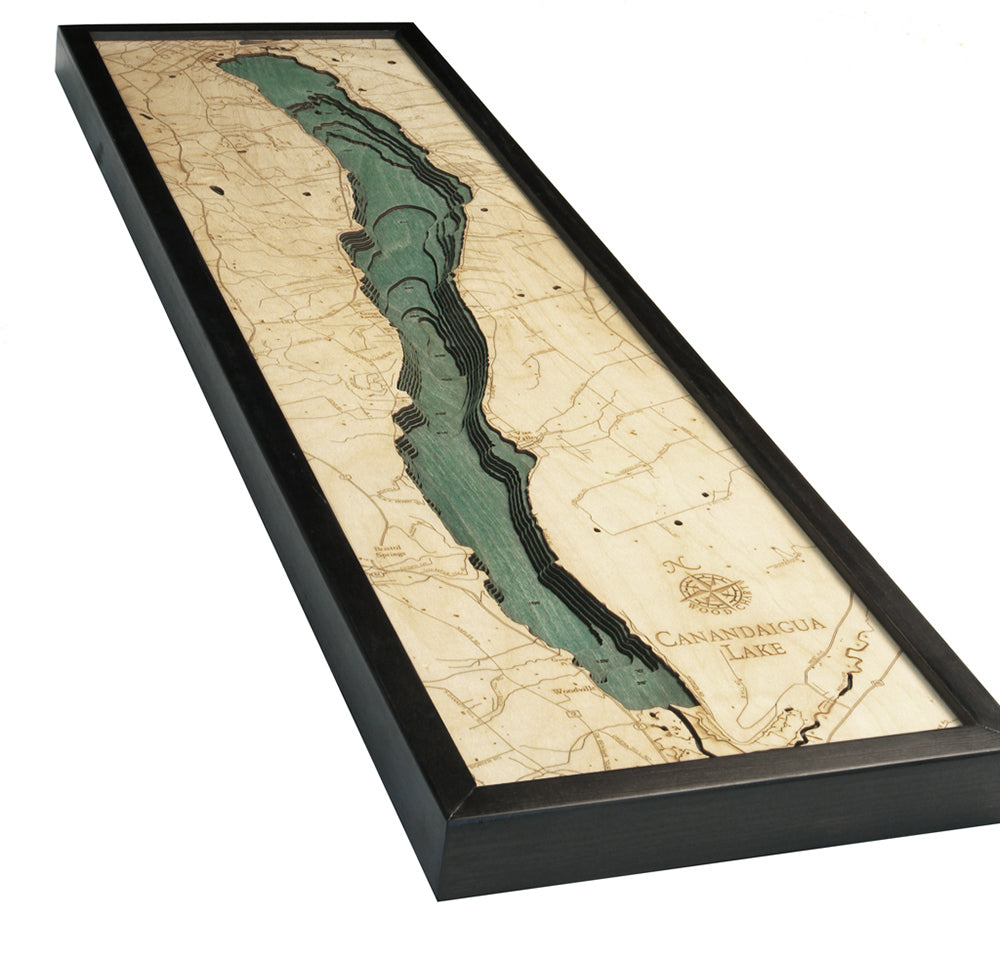 Canandaigua Lake, New York wood chart map made using green and natural wood on white background with dark frame laying at a flat angle