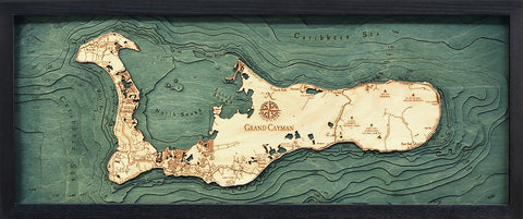 Grand Cayman wood chart map made using green and natural colored wood on black background with dark frame