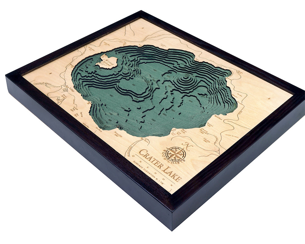 Crater Lake, Oregon wood chart map made using green and natural colored wood on white background with dark frame laying flat