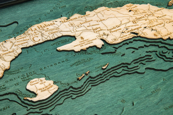 Cuba wood chart map made using green and natural colored wood up close