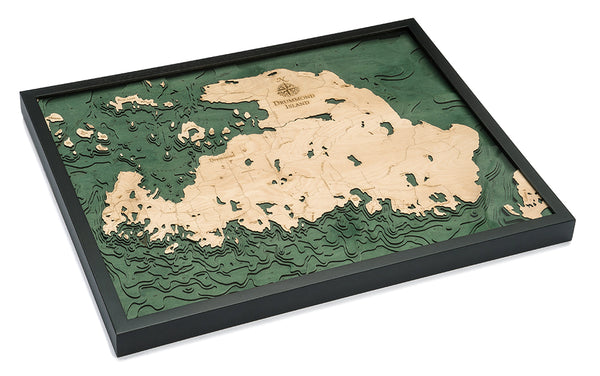 Drummond Island wood chart map made using green and natural colored wood on white background with dark frame laying flat