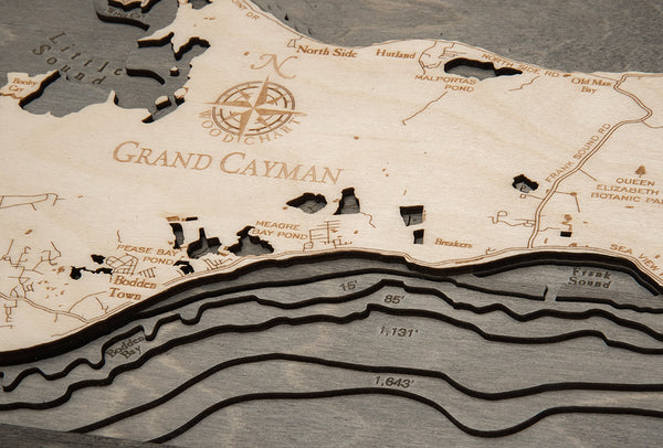 Grand Cayman wood chart map made using a darker green and natural colored wood up close