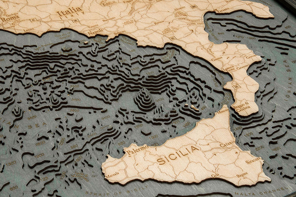 Italy wood chart map made using a darker green and natural colored wood up close