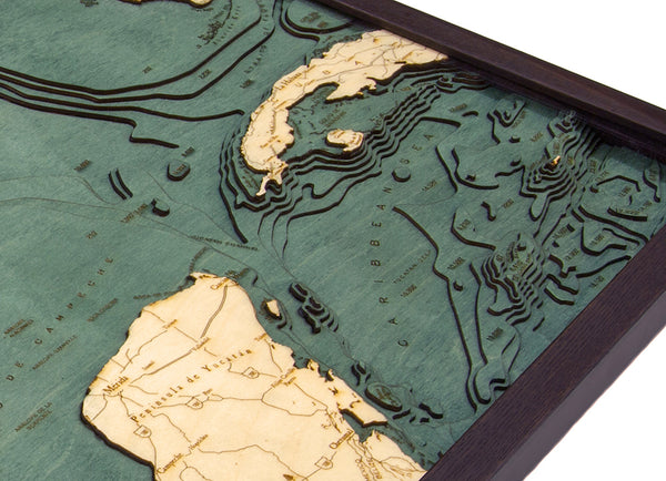 Gulf of Mexico wood chart map made using green and natural colored wood on white background with dark frame up close