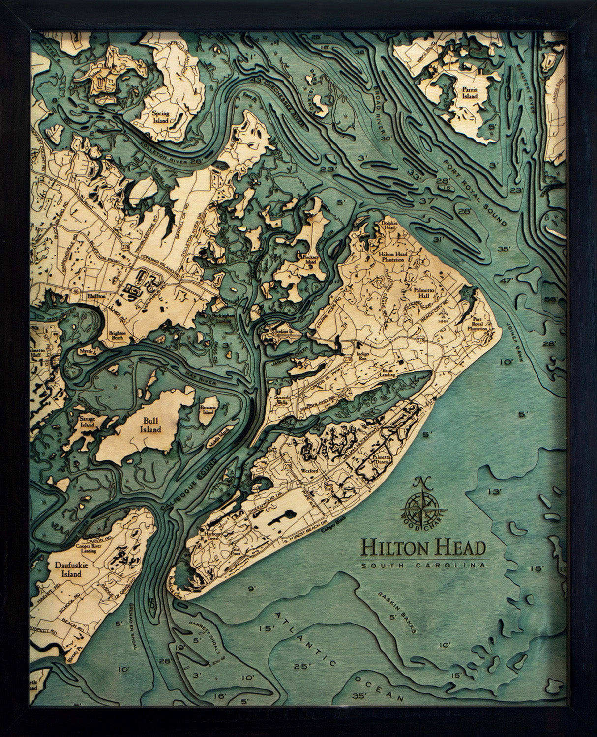 Hilton Head, South Carolina wood chart map made using green and natural colored wood on black background with dark frame