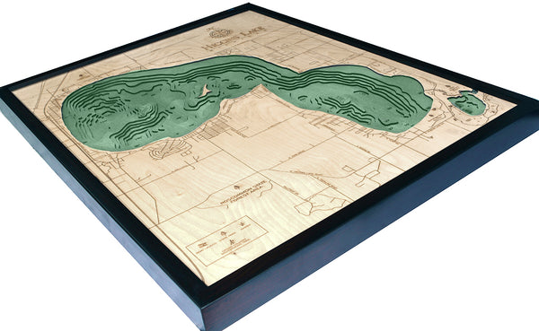 Higgins Lake, Michigan wood chart map made using green and natural colored wood on white background with dark frame laying flat