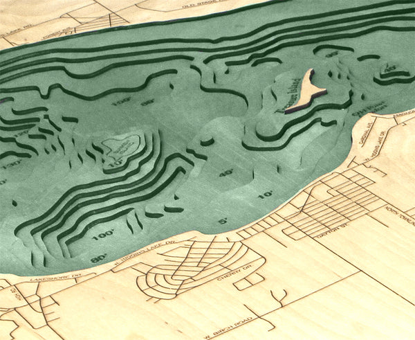 Higgins Lake, Michigan wood chart map made using green and natural colored wood up close