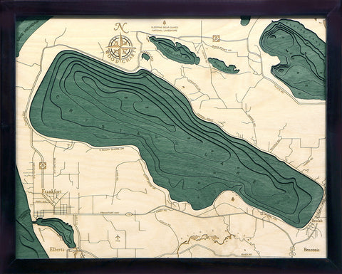 Crystal Lake, Michigan wood chart map made using green and natural colored wood on black background with dark frame